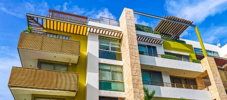 Immeuble en copropriété illustrant les nouvelles obligations imposées aux syndics par le décret 2025